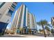 Modern condominium building with stylish architecture and private balconies on each floor at 504 N Ocean Blvd. # 411, Myrtle Beach, SC 29577