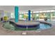 Enjoy the winding indoor pool with lush greenery and inviting lounge chairs by the ocean at 504 N Ocean Blvd. # 411, Myrtle Beach, SC 29577
