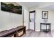 Living area featuring a washer and dryer unit and sleek wood-style flooring at 504 N Ocean Blvd. # 411, Myrtle Beach, SC 29577
