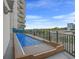 Balcony area with a shuffleboard game and views of the city at 504 N Ocean Blvd. # 411, Myrtle Beach, SC 29577