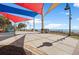 View of the walkway towards the beach with colorful shade awnings at 504 N Ocean Blvd. # 411, Myrtle Beach, SC 29577