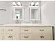 Bathroom vanity with double sinks, marble countertop, and brushed nickel faucets at 515 37Th Ave. N # 101, Myrtle Beach, SC 29572