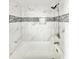 Bathroom with white tile, updated fixtures, and a shower-tub combination at 515 37Th Ave. N # 101, Myrtle Beach, SC 29572