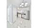 Modern kitchen featuring stainless steel appliances, white cabinets, and marble floors at 515 37Th Ave. N # 101, Myrtle Beach, SC 29572