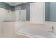 Clean bathroom features a soaking tub and shower with glass partition at 53 Hope Ln., Pawleys Island, SC 29585