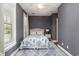 Cozy bedroom with a nautical-themed decor and natural light at 53 Hope Ln., Pawleys Island, SC 29585