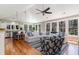 Open-concept living space with hardwood floors, a vaulted ceiling, and a seamless transition to the kitchen area at 53 Hope Ln., Pawleys Island, SC 29585