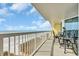Relaxing balcony view with outdoor seating overlooking the beach and ocean at 5404 N Ocean Blvd. N # 6-E, North Myrtle Beach, SC 29582