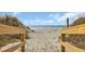 Picturesque beach access with sandy path through the dunes at 5404 N Ocean Blvd. N # 6-E, North Myrtle Beach, SC 29582
