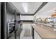 Well-equipped kitchen with modern appliances, counter space, and plenty of storage at 5404 N Ocean Blvd. N # 6-E, North Myrtle Beach, SC 29582