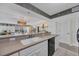 Modern kitchen featuring a breakfast bar and connecting to the living room at 5404 N Ocean Blvd. N # 6-E, North Myrtle Beach, SC 29582