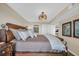 Spacious main bedroom with stylish furnishings and ensuite access at 5404 N Ocean Blvd. N # 6-E, North Myrtle Beach, SC 29582