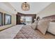 Comfortable main bedroom with access to balcony and beach views at 5404 N Ocean Blvd. N # 6-E, North Myrtle Beach, SC 29582