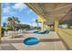 Inviting community pool area with lush landscaping, lounge chairs and sunny skies at 5404 N Ocean Blvd. N # 6-E, North Myrtle Beach, SC 29582
