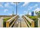 Direct beach access with an outdoor walkway leading to the ocean at 5404 N Ocean Blvd. N # 6-E, North Myrtle Beach, SC 29582