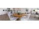 Cozy dining area seamlessly connects to the kitchen, creating an inviting space for shared meals and gatherings at 572 Strawberry Field Way, Galivants Ferry, SC 29544