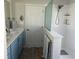 Bathroom includes a double vanity, walk-in shower, and plenty of storage at 59 Willowbend Dr., Murrells Inlet, SC 29576