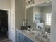 Ensuite bathroom features double sink vanity and plenty of cabinet space at 59 Willowbend Dr., Murrells Inlet, SC 29576