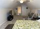 Bedroom with TV, bed, and relaxing chair at 59 Willowbend Dr., Murrells Inlet, SC 29576