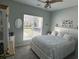 Cozy bedroom with comfortable furnishings, carpeted floors and great natural light at 59 Willowbend Dr., Murrells Inlet, SC 29576