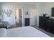 Spacious bedroom with walk-in closet and ensuite bathroom entrance at 59 Willowbend Dr., Murrells Inlet, SC 29576