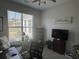 Office space with large window, desk, chair, and book shelves at 59 Willowbend Dr., Murrells Inlet, SC 29576