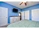 Spacious main bedroom with white dresser and doors at 6253 Catalina Dr. # 214, North Myrtle Beach, SC 29582