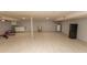 Open basement with tile flooring, a water heater, and workout equipment at 7638 Highway 905, Longs, SC 29568