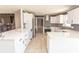 Spacious kitchen with modern appliances, quartz countertops, and open layout at 7638 Highway 905, Longs, SC 29568