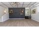 Spacious living room with hardwood floors and an entertainment area with wet bar at 7638 Highway 905, Longs, SC 29568
