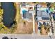 Birds eye view of the backyard featuring a swimming pool, back porch, and an adjacent pond at 806 Duncan Ave., Myrtle Beach, SC 29572