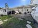 Inviting backyard patio with wooden deck, covered parking, and outdoor seating perfect for relaxing and entertaining at 806 Duncan Ave., Myrtle Beach, SC 29572