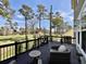Back deck with beautiful golf course views, perfect for relaxing and enjoying the serene outdoor space at 817 Falkirk St., Myrtle Beach, SC 29579