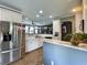Spacious kitchen features white cabinets, stainless steel appliances, and marble countertops at 817 Falkirk St., Myrtle Beach, SC 29579