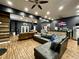 Spacious living room with two sectional sofas, hardwood flooring and abundant natural light at 817 Falkirk St., Myrtle Beach, SC 29579