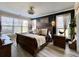 Comfortable bedroom offers lots of natural lighting, dark accent wall, and stylish decor at 817 Falkirk St., Myrtle Beach, SC 29579