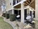 Outdoor seating area with swinging chairs, perfect for relaxation and enjoying the peaceful surroundings at 817 Falkirk St., Myrtle Beach, SC 29579