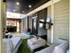 Covered patio with modern seating and outdoor entertainment system at 817 Falkirk St., Myrtle Beach, SC 29579