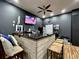 Entertain in this Personal cave with a stylish bar, wooden accents and granite countertops at 817 Falkirk St., Myrtle Beach, SC 29579