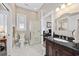 Bathroom featuring a marble floor, walk-in shower, and dark wood vanity at 820 Morrall Dr., North Myrtle Beach, SC 29582