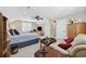 Spacious bedroom with two beds, a sofa, and a ceiling fan at 820 Morrall Dr., North Myrtle Beach, SC 29582