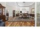 Elegant dining room with hardwood floors, chandelier, and seamless flow to the living areas at 820 Morrall Dr., North Myrtle Beach, SC 29582