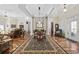 Spacious dining area with hardwood floors, open layout, and elegant furnishings at 820 Morrall Dr., North Myrtle Beach, SC 29582