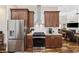 Kitchen features stainless steel appliances, granite countertops, and tile backsplash at 820 Morrall Dr., North Myrtle Beach, SC 29582