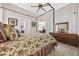 Main bedroom features a four-poster bed and an ensuite bathroom at 820 Morrall Dr., North Myrtle Beach, SC 29582