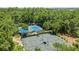 Well-maintained tennis courts in a lush green setting, perfect for active community recreation and enjoyment at 820 Morrall Dr., North Myrtle Beach, SC 29582