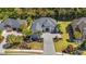 Stunning aerial view of a home with a long driveway and lush landscaping at 8504 Juxa Dr., Myrtle Beach, SC 29579