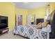 Spacious bedroom with a comfortable bed, ample storage, and natural light from the windows at 8504 Juxa Dr., Myrtle Beach, SC 29579