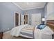 Spacious bedroom featuring a comfortable bed, large windows, and ample closet space at 8504 Juxa Dr., Myrtle Beach, SC 29579