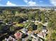 A tranquil aerial view showing the property surrounded by mature trees and stunning water views at 86 Old Barge Dr., Pawleys Island, SC 29585